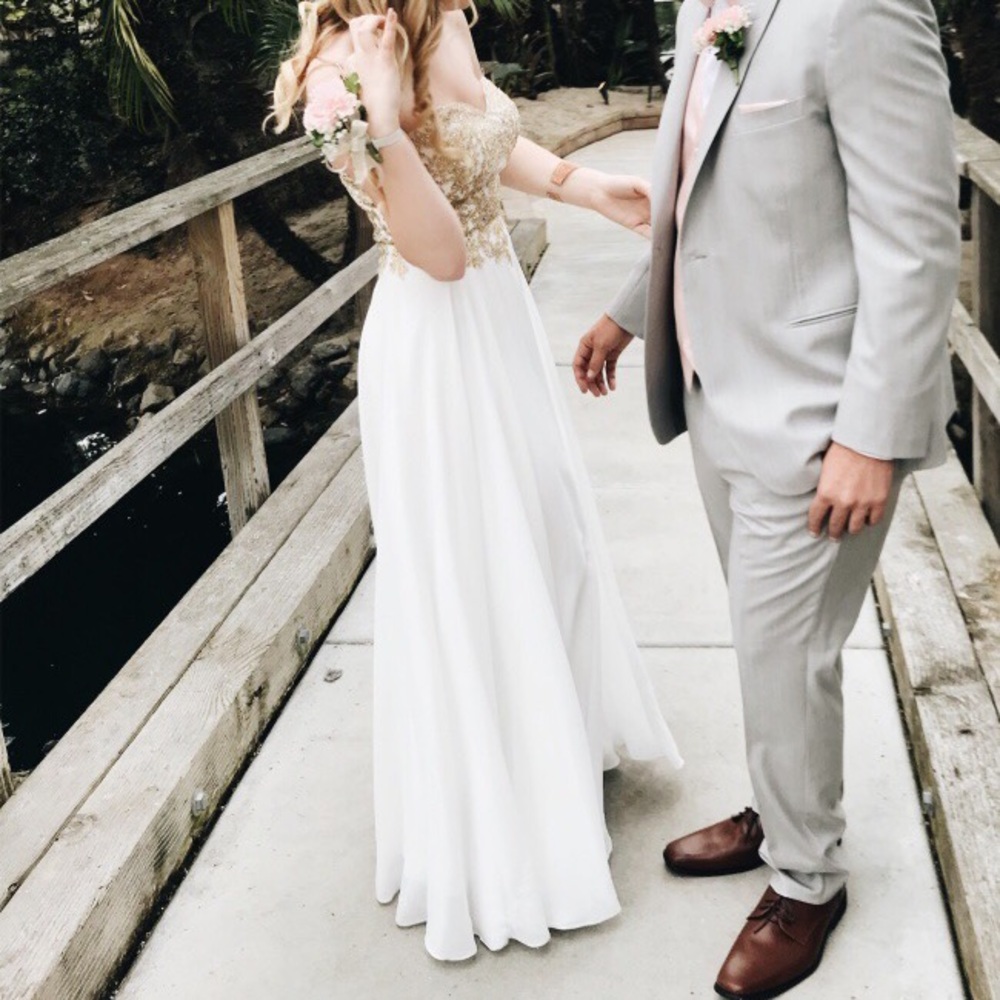 beautiful white prom dress with gold detailing